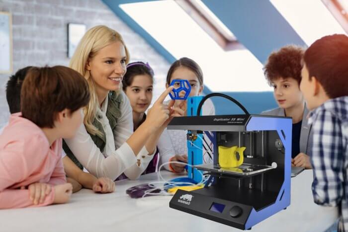 Kids learning 3d printing in school